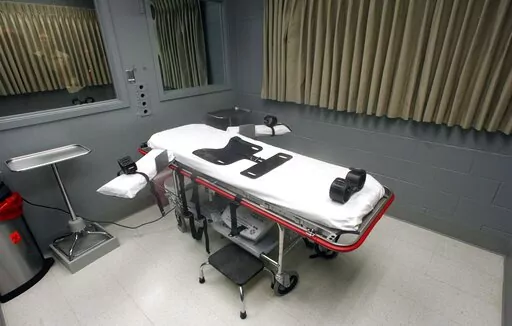 The execution room at the Oregon State Penitentiary is pictured on Nov. 18, 2011, in Salem, Ore. Oregon Gov. Kate Brown announced on Tuesday, Dec. 13, 2022, she is commuting the sentences of the 17 prison inmates in Oregon who have been sentenced to death to life imprisonment without the possibility of parole. (AP Photo/Rick Bowmer, File)