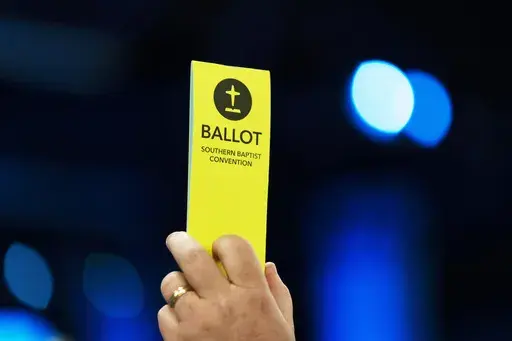 An Attendee holds up a ballot during the Southern Baptist Convention's annual meeting in Anaheim, Calif., Tuesday, June 14, 2022. Thousands will gather in Indianapolis, June 11-12, 2024, for the annual meeting of the Southern Baptist Convention. (AP Photo/Jae C. Hong, File)
