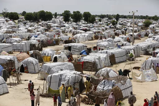 A top view of one of the biggest camp for people displaced by Islamist extremists in Maiduguri, Nigeria on Aug. 28, 2016. Droughts, flooding and a shrinking Lake Chad caused in part by climate change is fueling conflict and migration in the region and needs to better addressed, a report said Thursday, Jan. 19, 2023. ( AP Photo/Sunday Alamba, File)