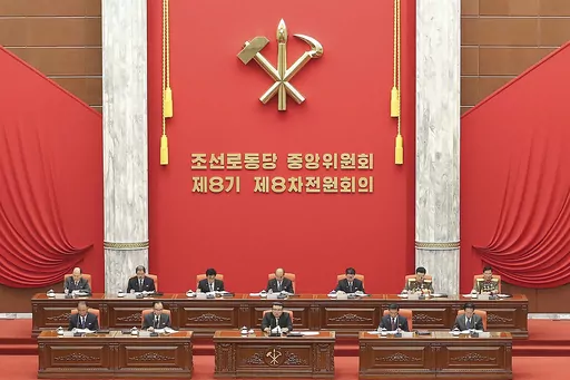 In this photo provided by the North Korean government, North Korean leader Kim Jong Un, bottom center on stage, attends an enlarged plenary meeting of the ruling Workers’ Party’s Central Committee at the party's headquarters in Pyongyang, North Korea, Friday, June 16, 2023. Independent journalists were not given access to cover the event depicted in this image distributed by the North Korean government. The content of this image is as provided and cannot be independently verified. Korean lan