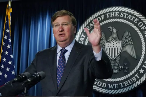 Mississippi Gov. Tate Reeves speaks during a news conference, May 18, 2022, in Jackson, Miss. The Republican governor signed bills in April to create a $10 million infrastructure grant program for private schools, staring in July. On Wednesday, June 15, 2022, Parents for Public Schools filed a lawsuit challenging the grant program and saying the Mississippi Constitution bans the use of public money for private schools. (AP Photo/Rogelio V. Solis, File)