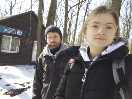 This March 2022 photo provided by Alona Shulenko shows her, right, and fellow zoologist Anton Vlaschenko outside the Feldman Ecopark area outpost of the Ukrainian Bat Rehabilitation Center in Kharkiv, Ukraine. “Our staying in Ukraine, our continuing to work – it’s some kind of resistance of Russian invasion,” Vlaschenko said via Zoom, a barrage of shelling audible in the background. “The people together in Ukraine are ready to fight, not only with guns. We don’t want to lose our coun