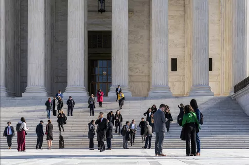 People leave the Supreme Court after oral arguments in Perez v. Sturgis Public Schools, Jan. 18, 2023, in Washington. The Supreme Court on Tuesday ruled unanimously for a a deaf student who sued his public school system for providing an inadequate education, a case that's significant for other disabled students. (AP Photo/J. Scott Applewhite)